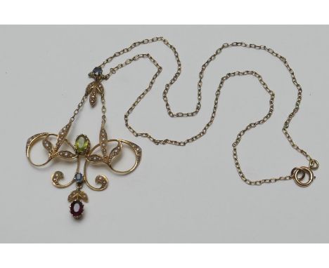 Edwardian 15ct gold multi-gem set openwork pendant necklace, the Art Nouveau inspired pendant having leaf fronds and centred 