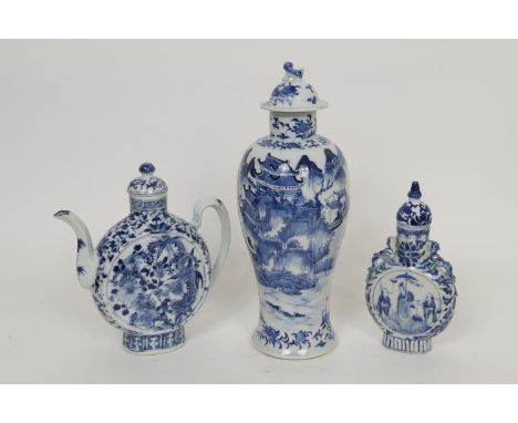 Chinese blue and white wine jug, moon shape decorated with dragons scrolling amidst foliage in underglaze blue and with a dom