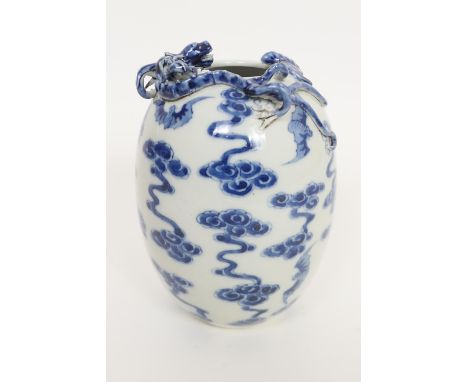 Chinese blue and white ovoid vase, late 19th Century, having applied dragon and bat at the inverted neck, the body decorated 