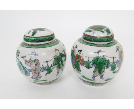 Pair of Chinese famille verte small ginger jars, late 19th Century, decorated with figures, Kangxi  four character mark to th