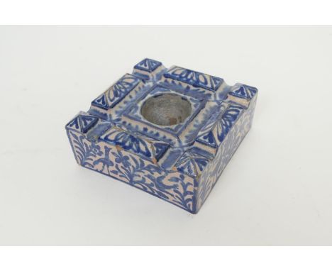 Spanish blue and white pottery inkwell, late 19th Century, decorated with birds and foliage, 12cm square 