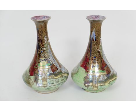 Pair of Wiltonware lustrous vases, circa 1930s, Art Deco style being of trumpet form decorated with exotic figures within a P