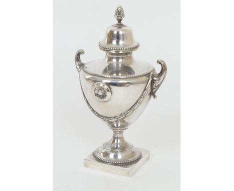 George V silver urn tea caddy, maker CWF, Sheffield 1929, domed cover with pinecone finial, shouldered body with lug handles 