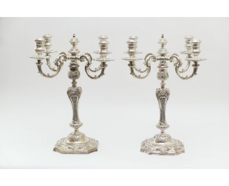 Fine pair of cast silver candelabra after designs by Paul de Lamerie, maker C J Vander Ltd, 1961, having four S-shaped acanth