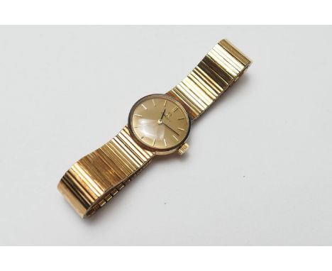 Omega 9ct gold lady's bracelet wristwatch, gold coloured 17mm dial, signed and with baton numerals, manual wind, with origina