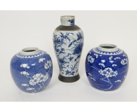 Chinese blue and white prunus pattern ginger jar, four character Kangxi mark, height 14cm; also a further prunus ginger jar, 