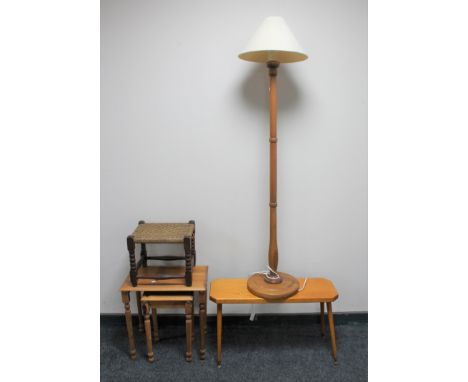 A nest of two pine tables, standard lamp and shade, an oak stool and a pine plank top coffee table 