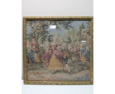 A gilt framed tapestry panel depicting figures in eighteenth century dress dancing