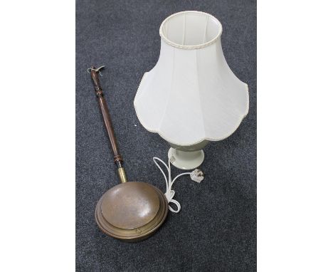 A wooden handled copper bed warming pan together with a Denby table lamp with shade by Allen Pickering 