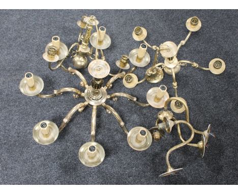 A brass eight arm chandelier together with a further brass light and three arm chandelier, pair of wall lights 