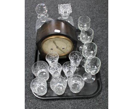 A tray of Bentima mantel clock, two crystal decanters and various glasses