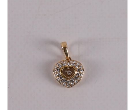 An 18 kt 750/1000 gold heart-shaped pendant with 34 brilliants of 0.86 ct in total G-VVS. Numbered, marked "Chopard".