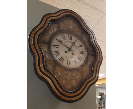 An ox eye 'Oeil de Boeuf' wall clock with decoration in, among other things, mother of pearl, France ca. 1880.