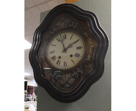 An ox eye 'Oeil de Boeuf' wall clock with decoration in, among other things, mother of pearl, France ca. 1880.
