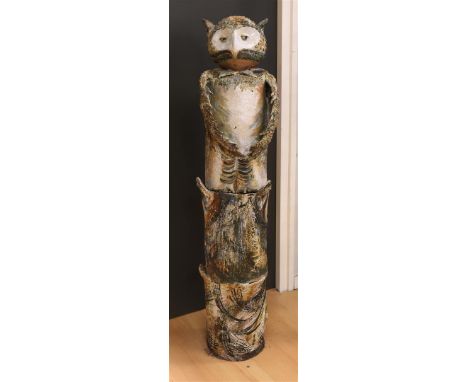 Budelman, Ed (*). A polychrome glazed four-part ceramic garden object with owl, height 90 cm, tot. 4x.