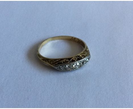 A late Victorian diamond five stone boat shaped ring. Approx. 2 grams. Est. £80 - £120.