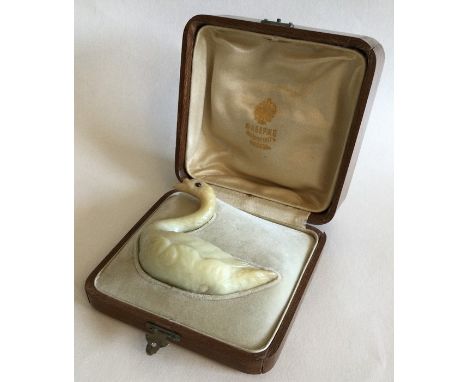 A good Russian hardstone figure of a swan with textured body and cabochon ruby eyes contained within a box marked 'Fabergé', 