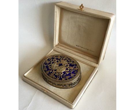 A heavy large Italian silver gilt and enamelled box contained within a fitted case. Approx. 240 grams. Est. £250 - £300.