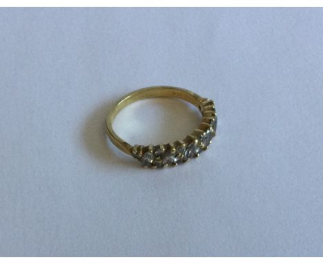 A good pear shaped diamond half hoop ring in 18 carat claw mount. Approx. 3 grams. Est. £150 - £200.