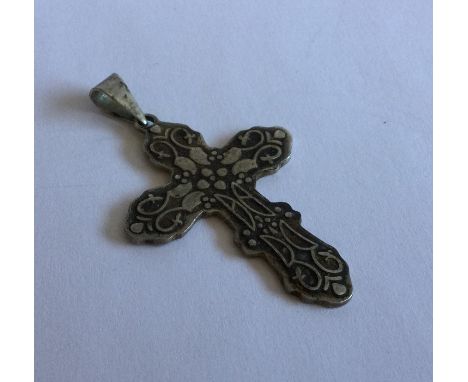 A Russian silver cross with loop top. Approx. 11 grams. Est. £20 - £30.