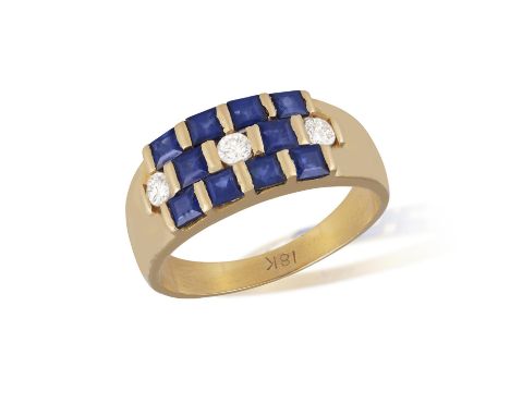 A Sapphire and diamond ringWith three rows, the central row set alternately with round, brilliant-cut diamonds and step-cut s