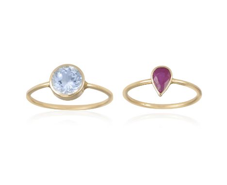 Two gem-set stacking ringsIncluding: a pear-shaped ruby-set ring and a round, mixed-cut aquamarine-set ring, both mounted in 