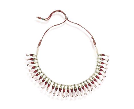 A 19th century Indian, ruby, diamond, seed pearl and vari-coloured enamel fringe necklaceThe white, green and red enamel nave