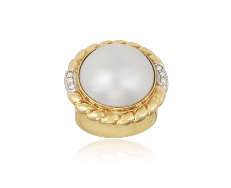 A Mabé pearl and diamond ringThe mabé pearl flanked by three diamonds to each side, mounted in 18ct gold, ring size J Conditi