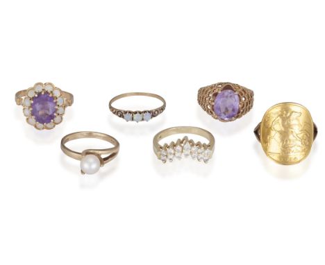 A Small collection of six ringsIncluding inter alia: a 14ct gold, diamond wishbone ring; a half-sovereign gold coin, mounted 