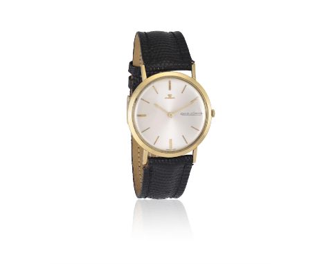 An 18ct gold wristwatch by Jaeger-LeCoultre Mechanical movement, the circular silvered dial with baton hour markers and hands