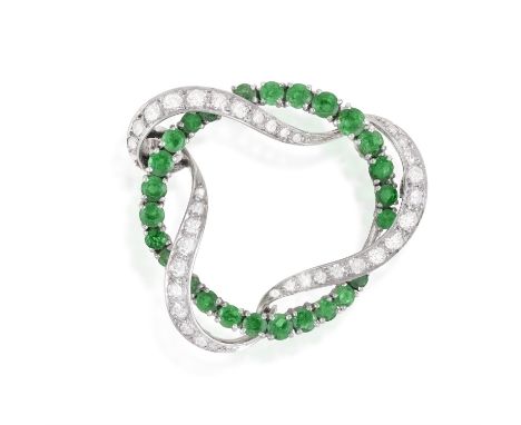 A Diamond and emerald wreath broochThe ring of circular-cut emeralds, entwined with a ribbon pavé-set with single and round, 