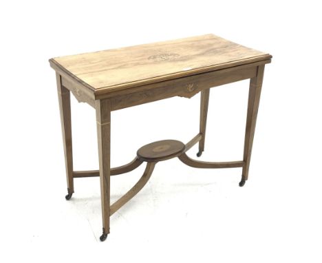 Edwardian inlaid rosewood card table, fold over moulded rectangular top with baize lined interior, square tapering supports j