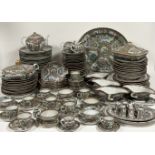 An extensive Canton famille rose porcelain assembled dinner service, largely 20th century, in a