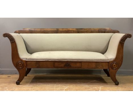 A 19th century Biedermeier mahogany scroll arm sofa, the moulded crest rail above back, arms, and squab cushion upholstered i