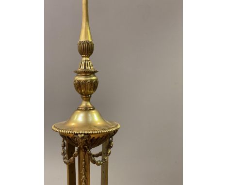 An early 20th century gilt-brass lamp standard in the Neoclassical taste, three branches issuing from a well-cast column, hav