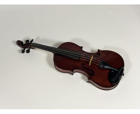 A French Mirecourt violin, c. 1900/1920, with one piece back and bearing "Michel Ange Garini" paper label, in a modern soft c