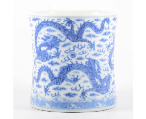 Chinese blue and white jar, bearing Kangxi six-character mark, slightly waisted form, decorated with dragons chasing a flamin