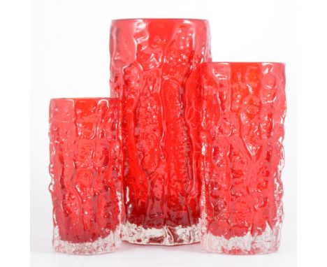 Geoffrey Baxter for Whitefriars, three Textured glass 'Bark' vases, ruby colourway, 15cm, 18.5cm, and 23cm high. (3)