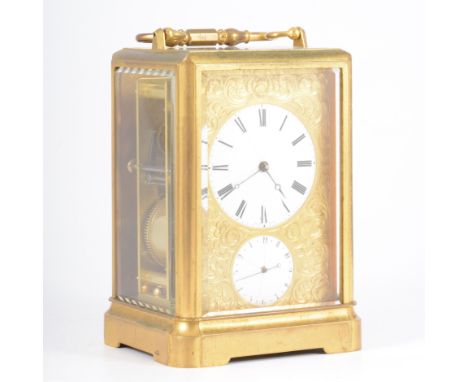 A French brass case alarm carriage clock, moulded outlines, enamelled dials, the alarm dial having Arabic numerals, faced by 