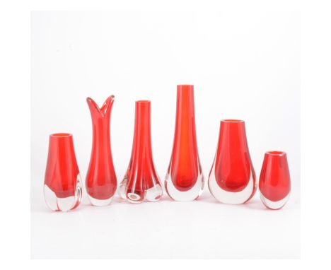 Geoffrey Baxter for Whitefriars, nine cased ruby glass vases, various patterns and sizes. (9)