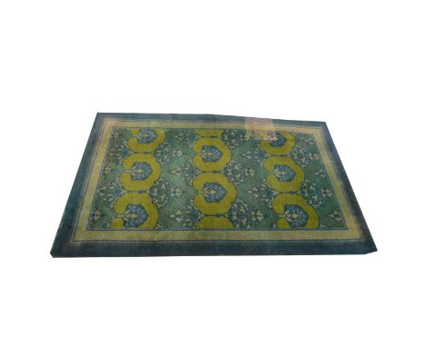 Charles Francis Voysey, a Glenmuir design Donegal woollen carpet, early 20th century,  in green and blue colour scheme, patch