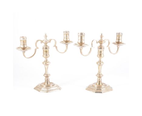 Pair of George II style silver two-light candelabra, Edward Barnard &amp; Sons, London 1973, twin branches, knopped columns, 