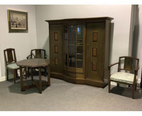 A Continental Art Deco dining room suite, stinkwood or teak veneer, oak frame and other exotic hardwoods, including: a large 