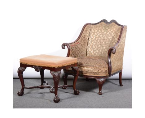 Mahogany framed three piece lounge suite, probably American, early 20th Century, variously upholstered, the cresting with twi