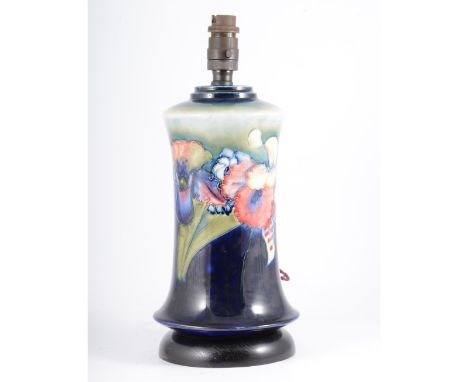 William Moorcroft, 'Orchid' a table lamp, circa 1935, waisted form, navy ground, on additional turned wood base, with cream s