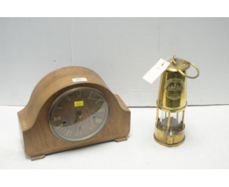 A brass Eccles Type 6 Protector miner's lamp; together with a walnut mantel clock with roman dial.