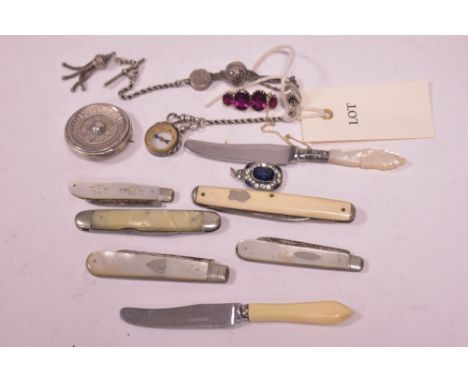 A four stone garnet brooch, in yellow metal mount; a silver watch chain with compass fob; a selection of fruit and butter kni