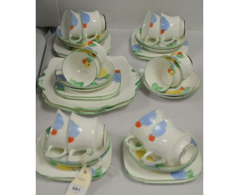 An Art Deco style Paragon Crocus tea set for twelve people, comprising: cups, saucers, side plates, and two sandwich plates.