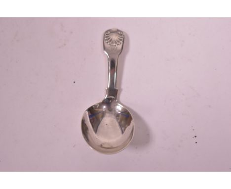 A George III silver caddy spoon, by George Wintle, London 1816, in fiddle pattern with shell finial and engraved initials.