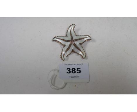 A Norwegian silver white enamel starfish pattern brooch, by Ivar Holth.
